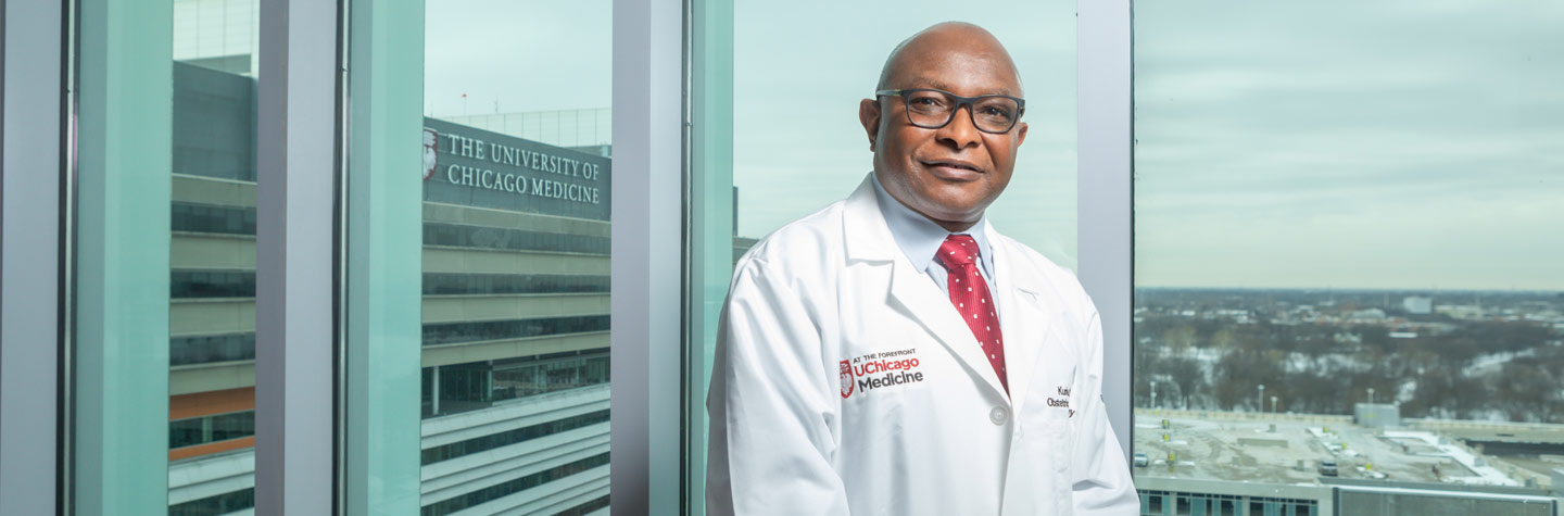 Kunle Odunsi, MD, Director of the Comprehensive Cancer Center, with a view of the Center for Care and Discovery in the background