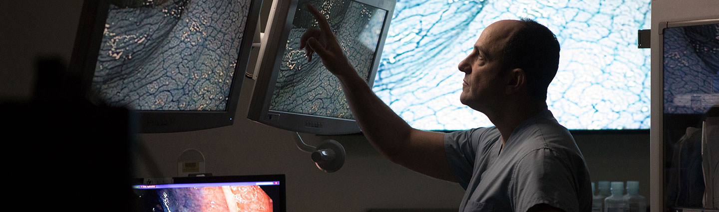 Dr. David Rubin using advanced technology to diagnose a patient