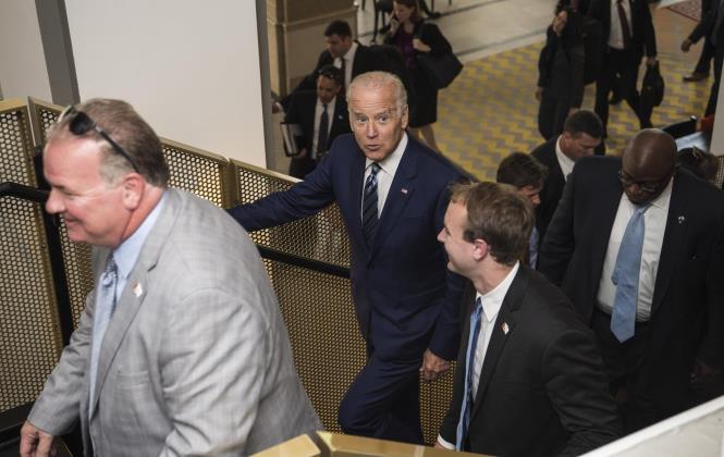 Vice President Joe Biden arrives to launch the NCI Genomic Data Commons (GDC), a system designed and developed by the Center for Data Intensive Science at the University of Chicago and presented Monday, June 6, 2016, at their office in the Shoreland in Chicago. (Photo by Robert Kozloff)