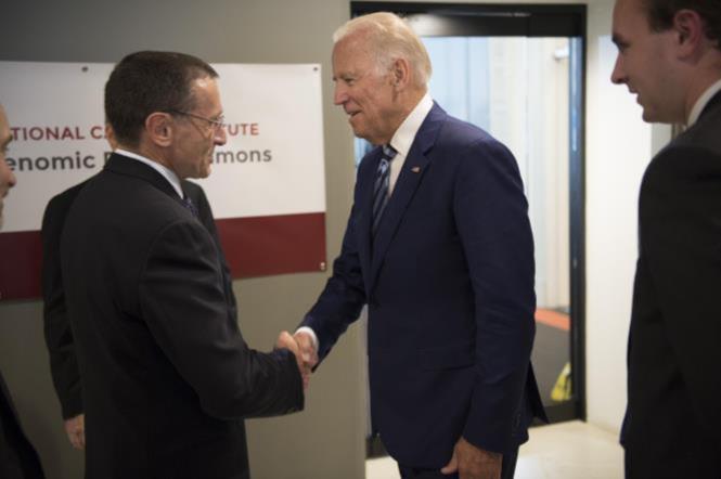 Vice President Joe Biden greets Kenneth Polonsky, MD, executive vice president for Medical Affairs, as he arrives to launch the NCI Genomic Data Commons (GDC), a system designed and developed by the Center for Data Intensive Science at the University of Chicago and presented Monday, June 6, 2016, at their office in the Shoreland in Chicago. (Photo by Robert Kozloff)