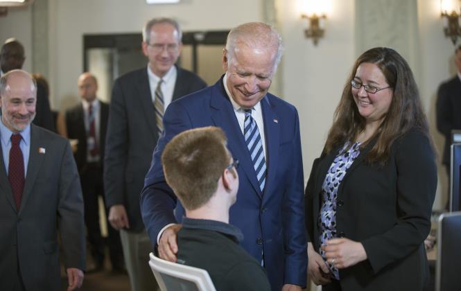 Vice President Joe Biden thanks Josh Miller, software engineer, with Allison Heath,PhD, technical director of the GDC, as he tours the NCI Genomic Data Commons (GDC), a system designed and developed by the Center for Data Intensive Science at the University of Chicago and presented Monday, June 6, 2016, at their office in the Shoreland in Chicago. (Photo by Robert Kozloff)