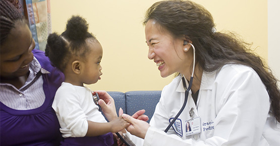 Dr. Grace Mak with patient
