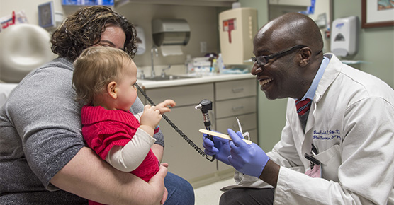 Dr. Russell Reid with patient Molly Lawson