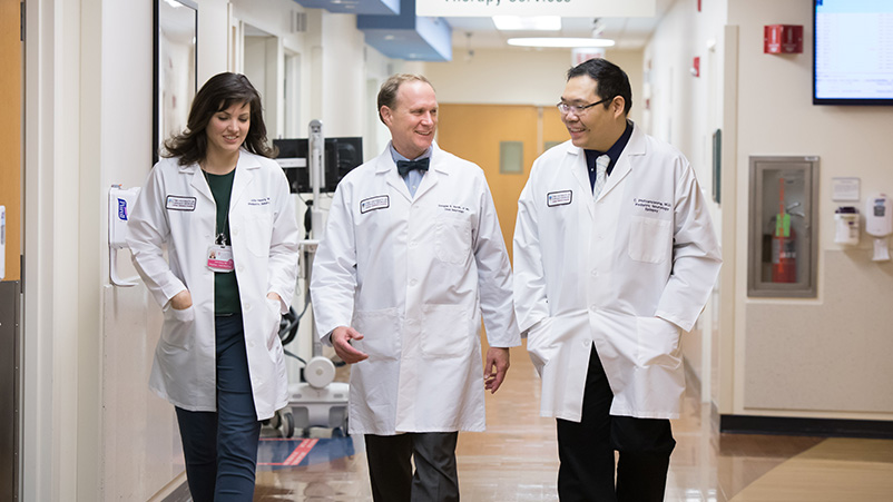 Drs. Julia Henry, Douglas Nordli and Chalongchai Phitsanuwong