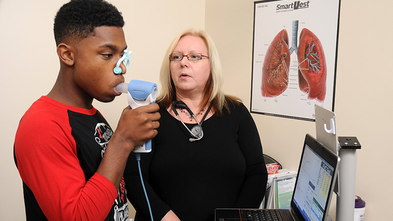 Louise Giles MD with patient