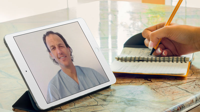 Urologist Scott Eggener, MD, giving a video visit