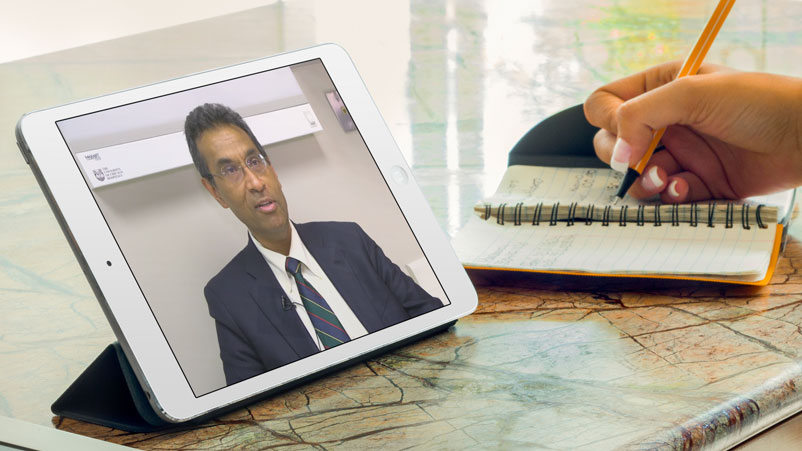 Valluvan Jeevanandam, MD, giving a telemedicine video visit
