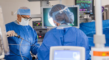 Vivek Prachand, MD, in surgery