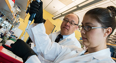 Gastroenterology researcher taking a sample