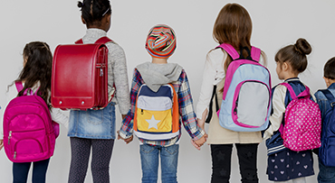 Group of kids going to school