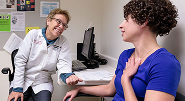 Dr. Arlene Chapman, a nephrologist, meets with a patient