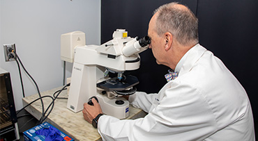 Image of Dr. Eric Beyer conducting pediatric cancer research