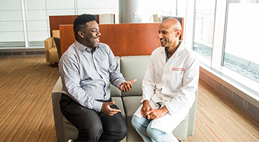 Dr. Mustafa Hussain pictured with David Dodd at CCD