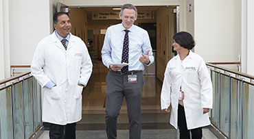 Portrait of Dr. Michael R. Charlton, Dr. K. Gautham Reddy and Dr. Sonali Paul
