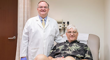 J. Michael Millis, MD, with a liver transplant patient