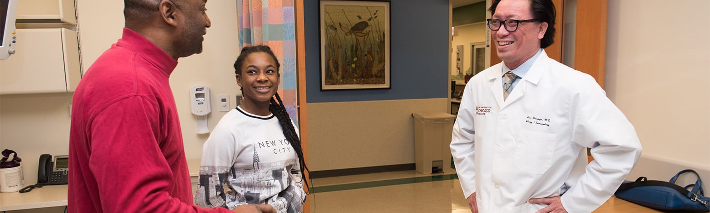 Dr. Handoyo with patient