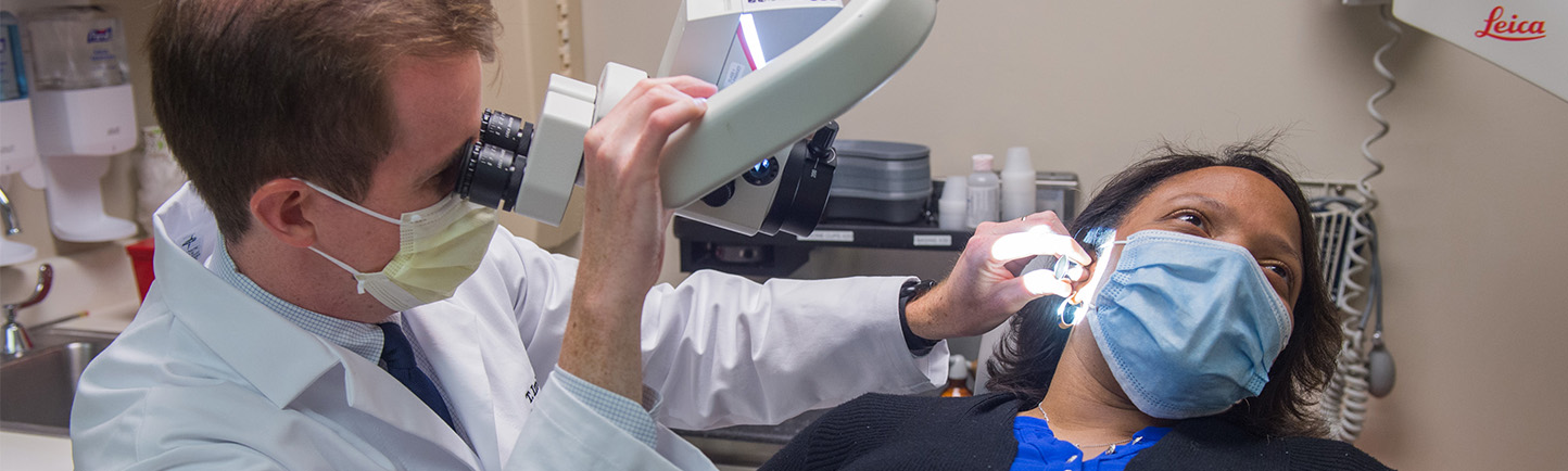 Image of Dr. Imbery working with a patient