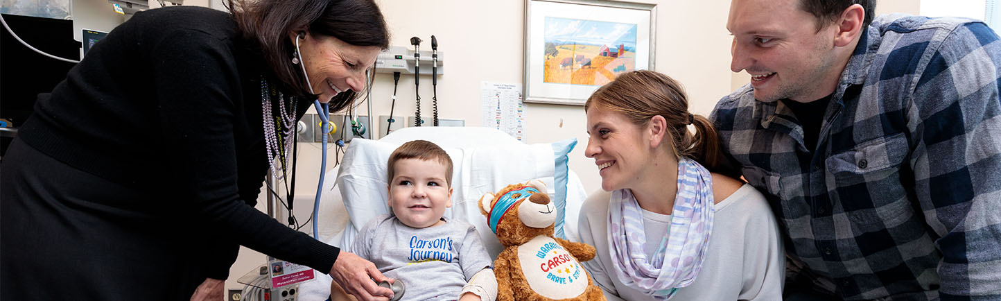 Image of Dr. Cohn working with pediatric patient