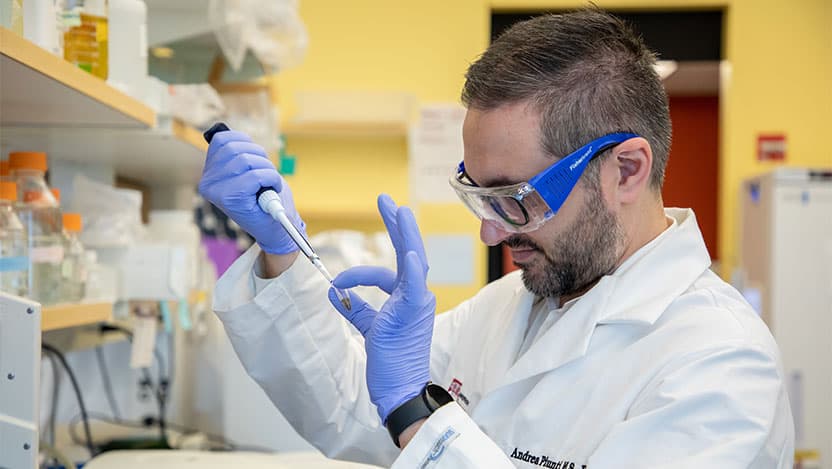 Man working in lab using equipment