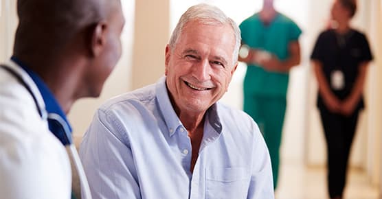 Image of doctor meeting with patient
