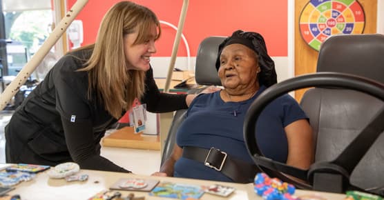 A female patient with her female physical therapist