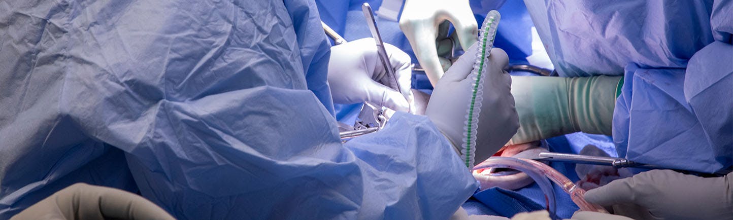 Surgeons working in an operating room.