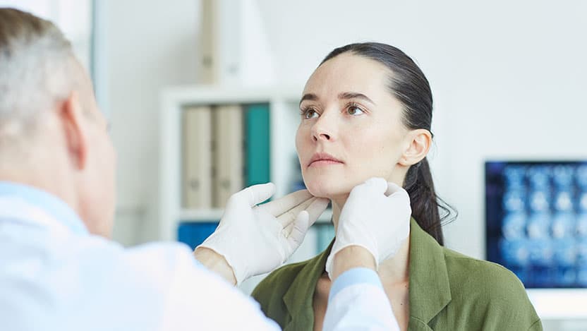 A young woman in a doctor's office.