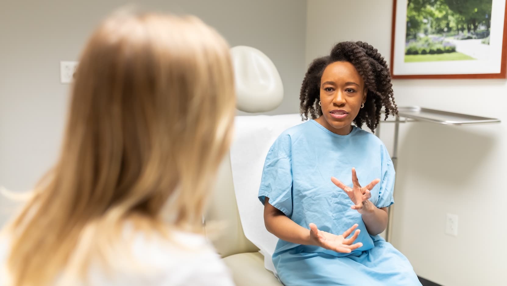 Doctor and patient in exam room