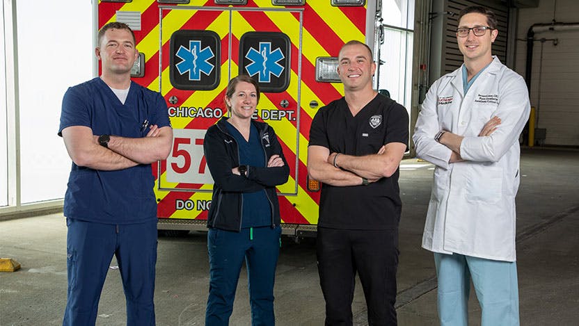 Bernard Lease, CRNA, Aaron Trautmann, DO, Alexandra Barikian, RN, and Nathan DeCarli, RN, are all members of the U.S. Army’s 759th Forward Resuscitative Surgical Team (FRST) who provide care for patients at UChicago Medicine as part a military civilian partnership. (Photo by Jordan Porter-Woodruff)