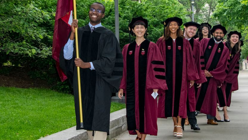 Members of Pritzker School of Medicine's Class of 2024 make their way into Rockefeller Memorial Chapel May 24 for their division academic ceremony.