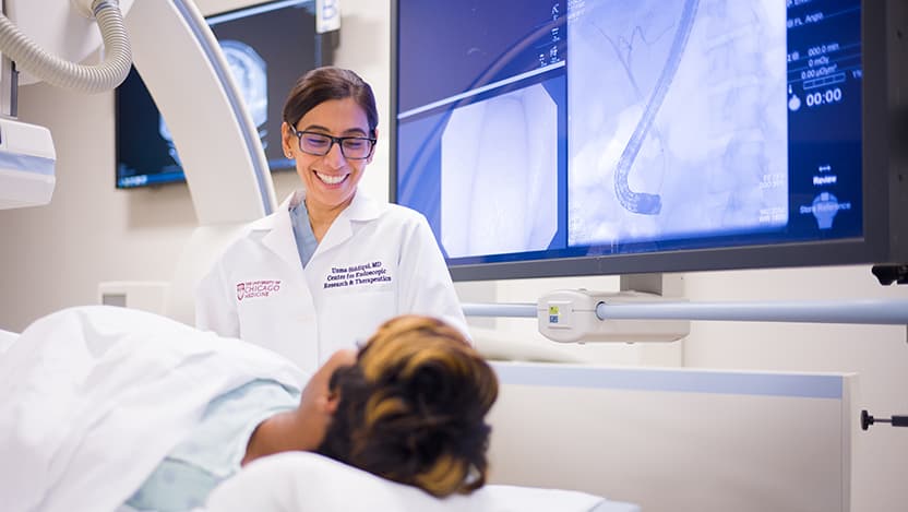 Uzma Siddiqui, MD, with a patient