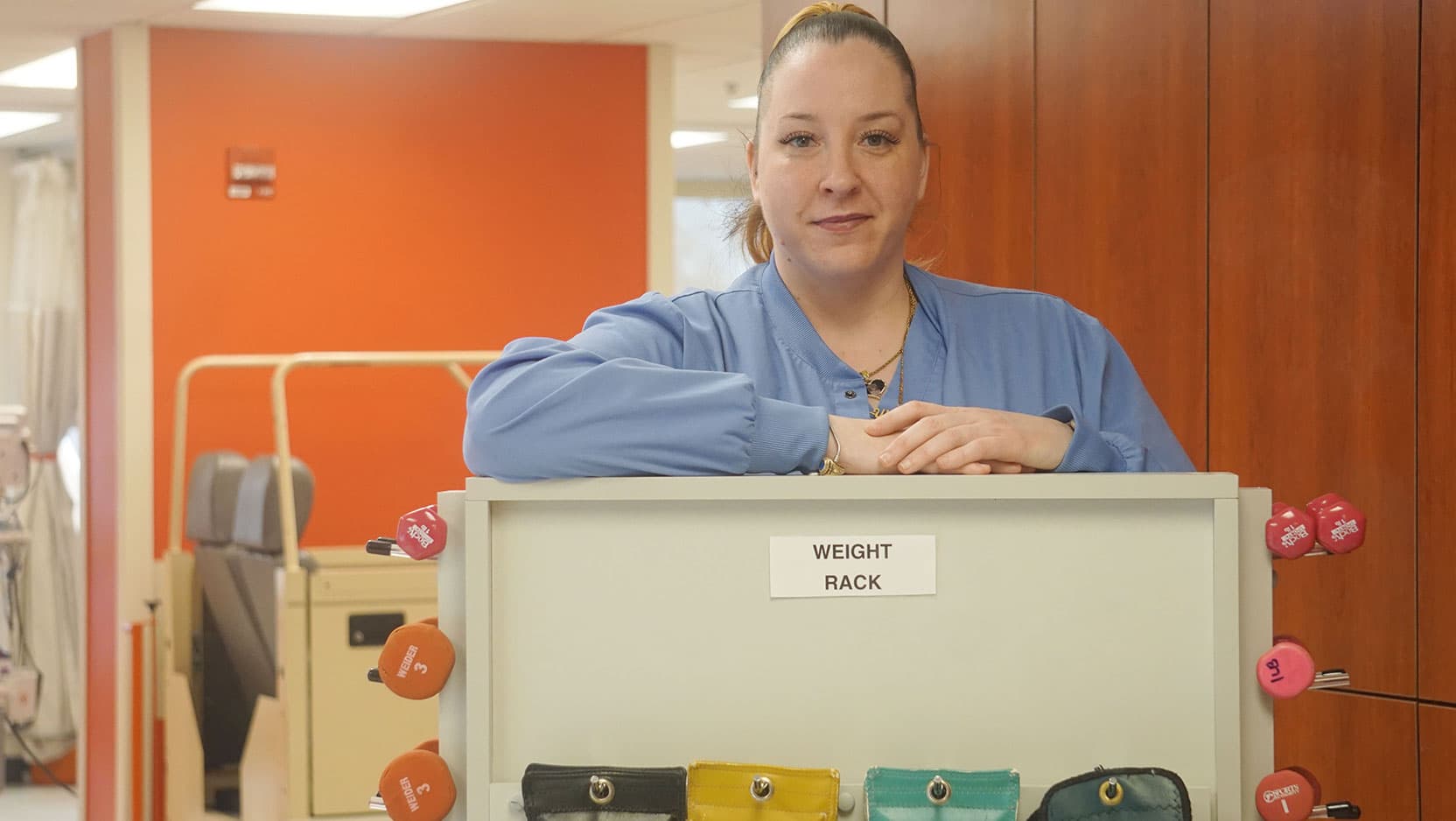 Christina Evans, CNA, works at UChicago Medicine Inpatient Rehabilitation at Ingalls Memorial Hospital in Harvey, the same place that helped her get back to her life after a motorcycle crash.