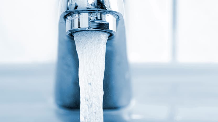Image of faucet with running water