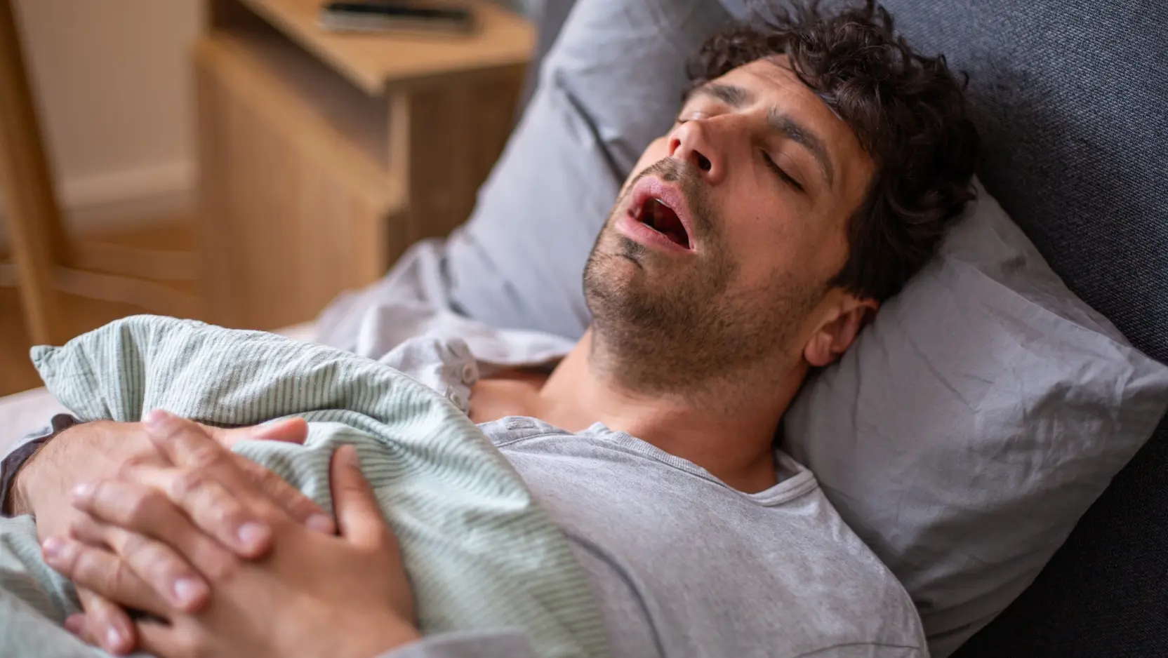 man sleeping with his mouth open