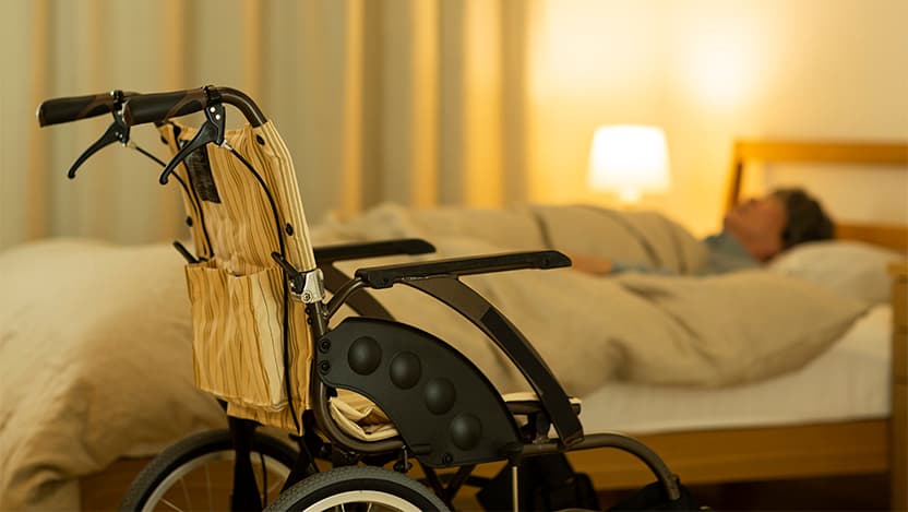 Resident laying in ben