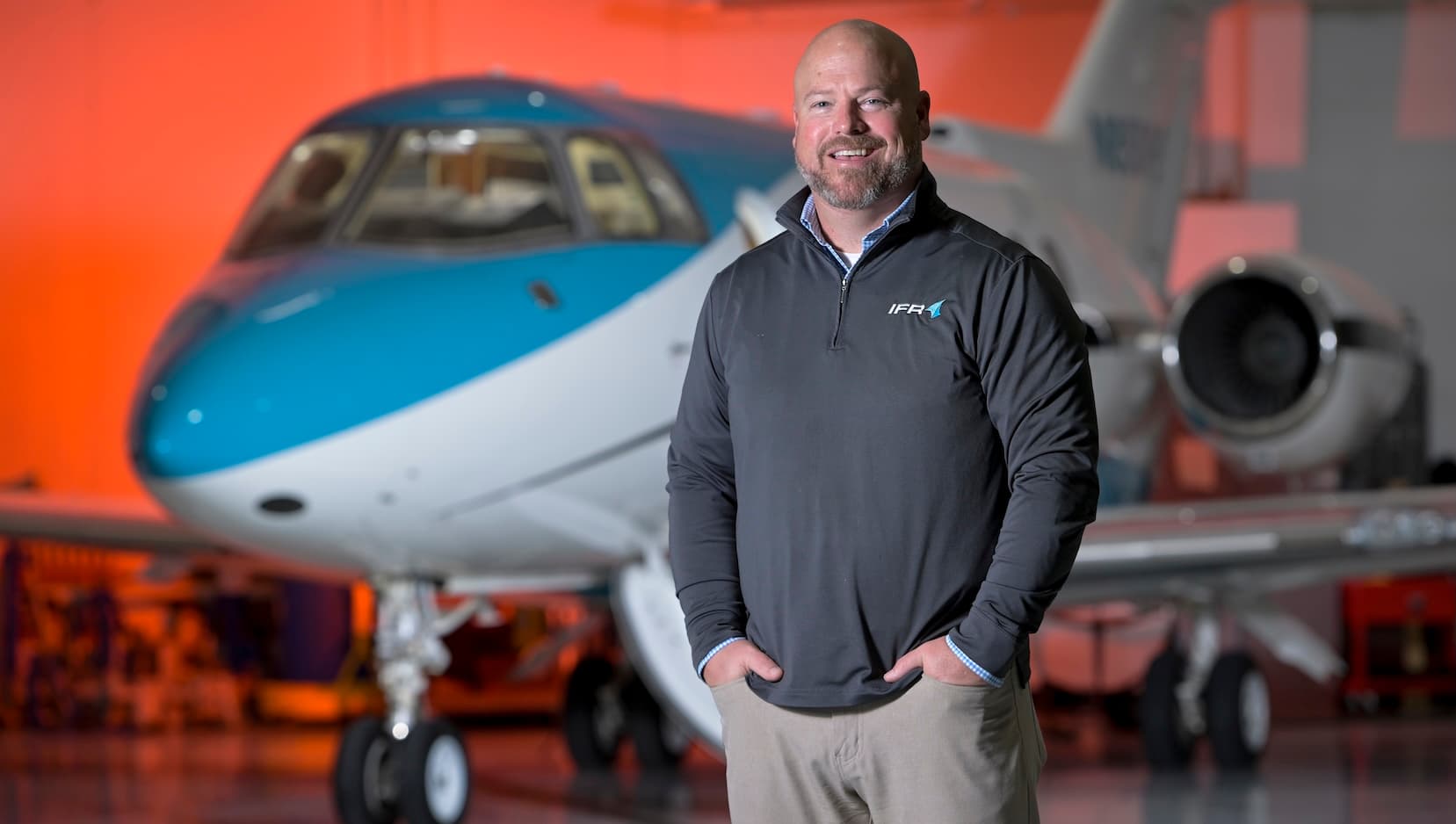 Chris Guare in front of plane