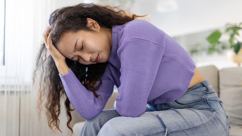 Woman experiencing pelvic pain