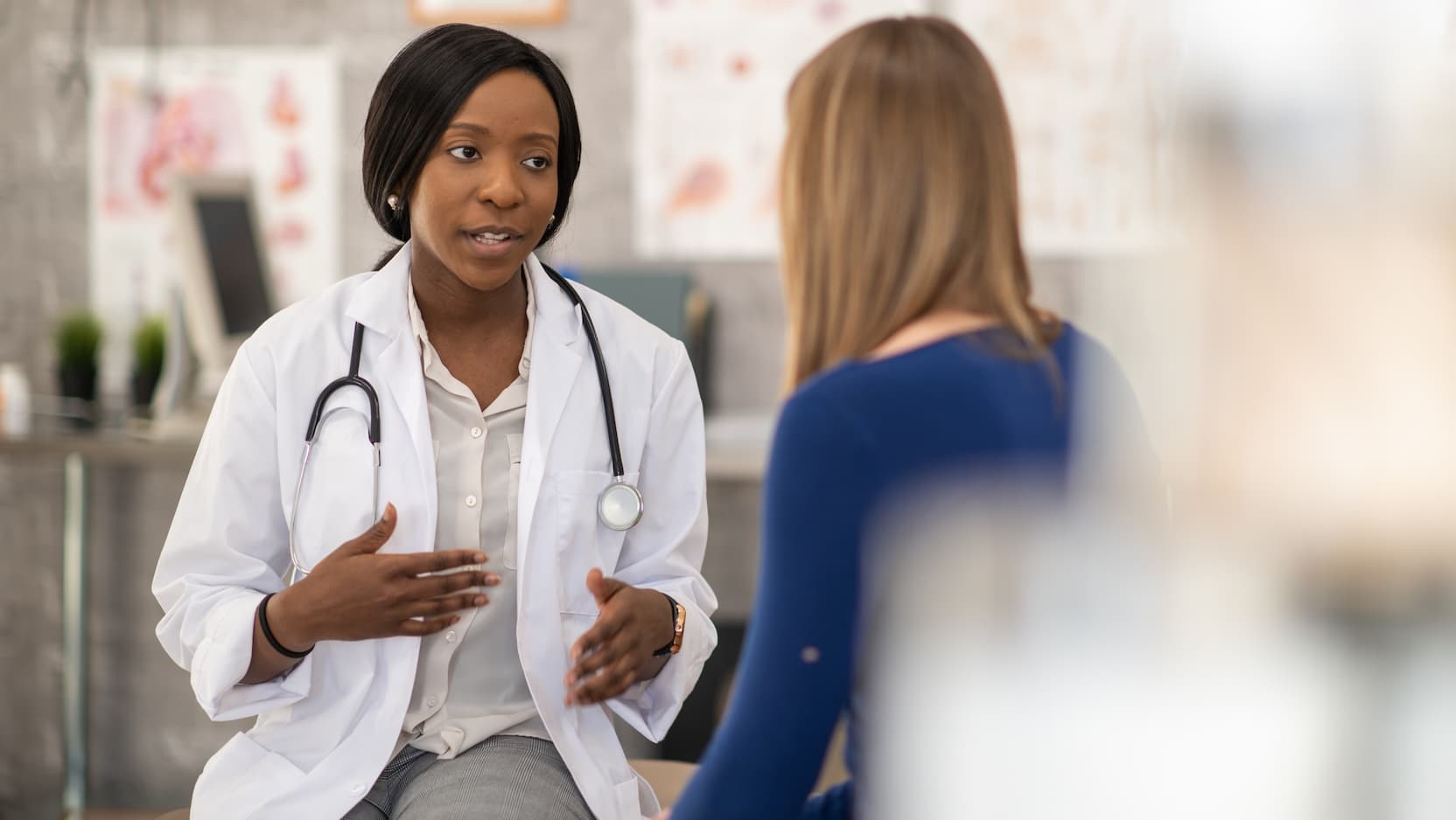 female doctor and female patient discussing
