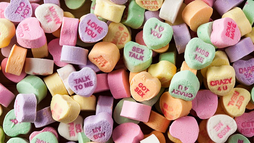 Candy hearts with sexual health conversation phrases