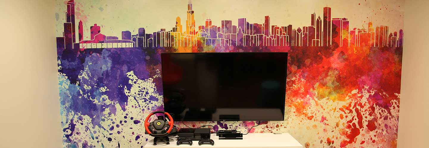 Artwork in patient lounge for teens with cancer at Comer Children's Hospital