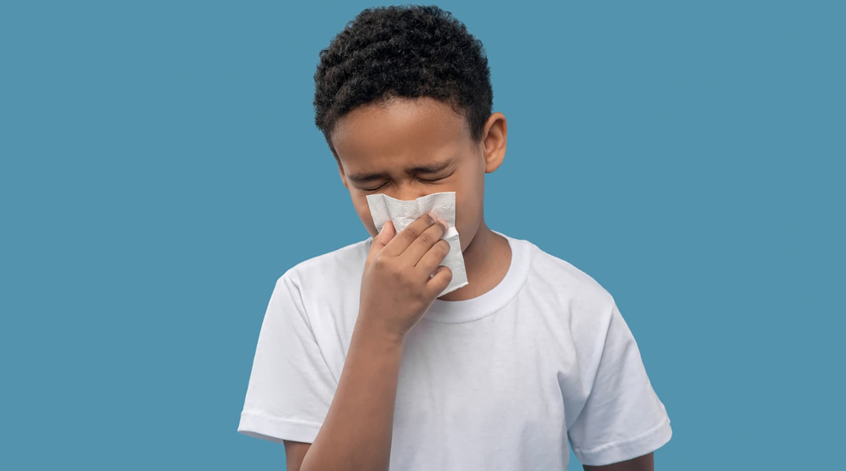 child sneezing