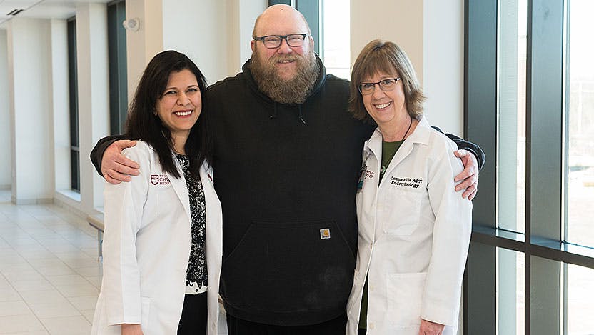 Diabetes patient Michael Lustro with nurse Donna Ellis and Dr. Farah Hasan at UChicago Medicine's Orland Park clinic
