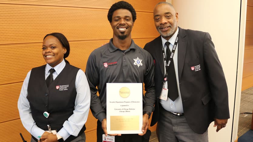 Members of UChicago Medicine's public safety team pose with a new award from the International Association for Healthcare Security & Safety.