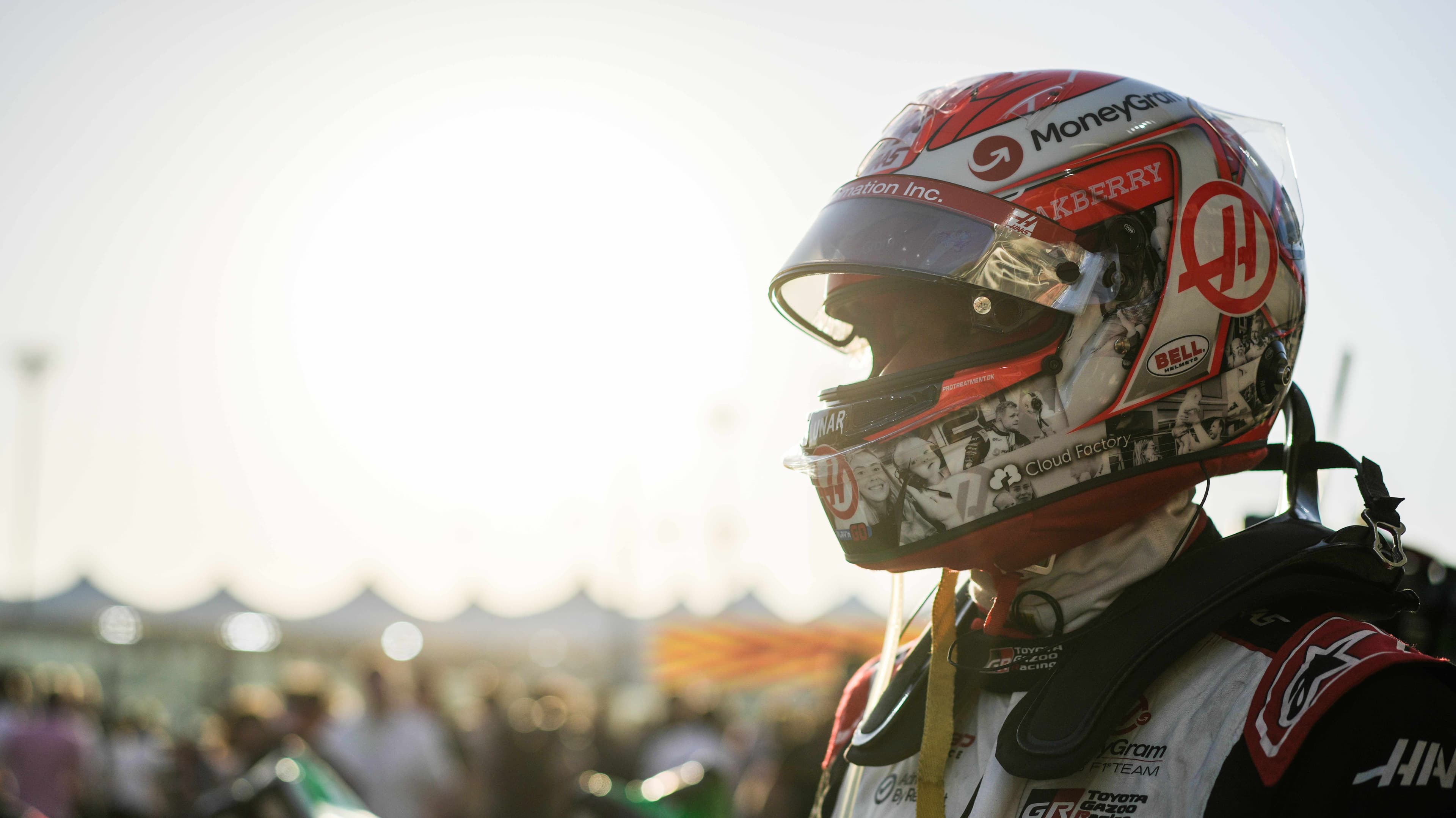 F1 driver focused on his helmet