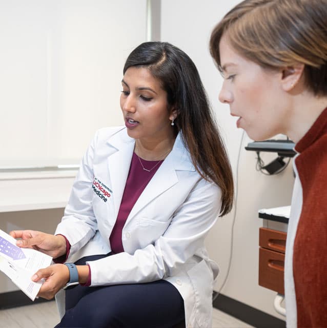 Shivika Trivedi-Kapadia, MD, and patient in clinic