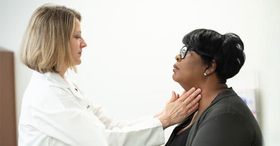 Olwen Hahn, MD, and patient in clinic