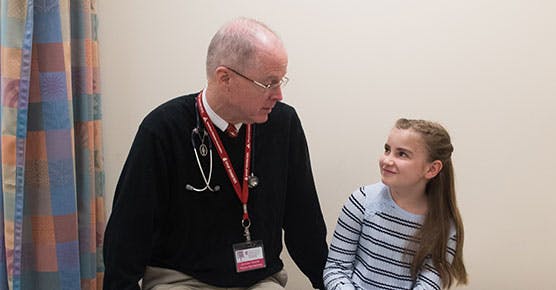 Dr. Christopher Clardy, with patient Gabrielle Mukenschnabl