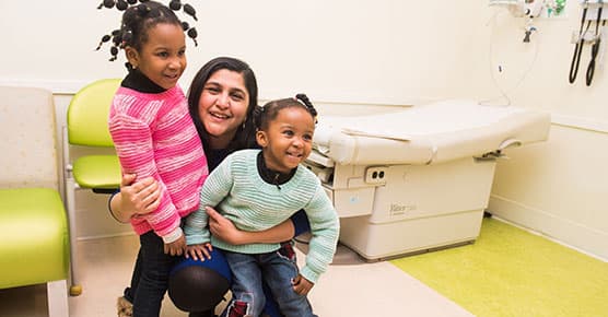 Dr. Peddinti with patients at La Rabida