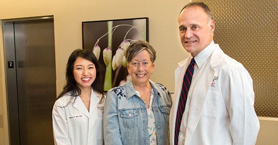 (L-R) Grace Suh, MD, medical oncologist, Elaine Johnson, patient, and Michael Bishop, MD, medical oncologist at the University of Chicago Medicine Comprehensive Cancer Center at Silver Cross Hospital. 
