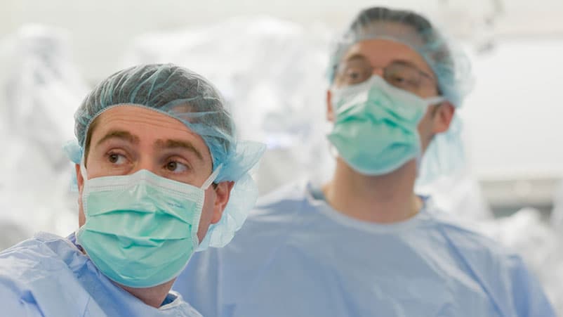 Physician Konstantin Umanskiy, MD, Assistant Professor of Surgery, in surgery